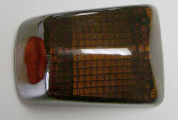 Dark indicator lens. 7.2cm long, 4.2cm wide (ID). 60-76033